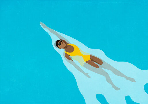 Woman swimming backstroke in water

