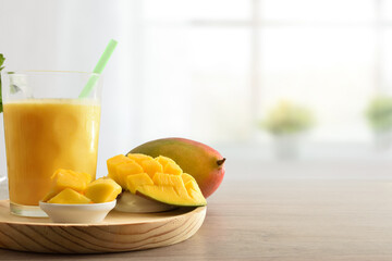 Healthy mango juice with milk and portions of fruit kitchen