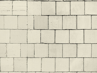 Texture of shabby wall lined with limestone tiles.