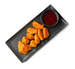 Fried chicken nuggets served with sauce isolated on white