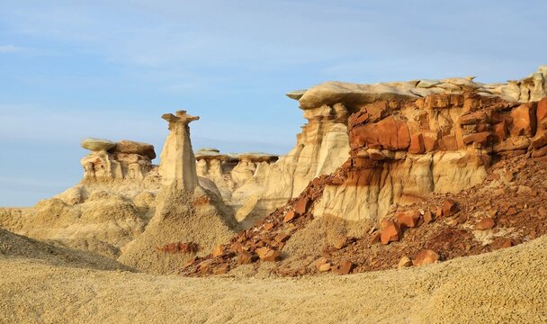 the colorful, eroded conversing hoodoos rock formations  at dusk in the hunter wash of the bisti badlands near farmington, new mexico