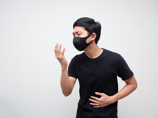 Sick man with mask black shirt cough on white isolated space