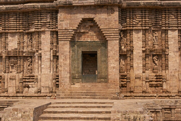 Fototapeta na wymiar Detail of religious carvings decorating the entrance to the ancient Surya Hindu Temple at Konark Orissa India. 13th Century AD