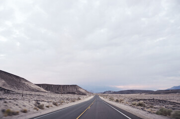 USA, DEATH VALLEY: Scenic landscape view of the desert mountains with the road