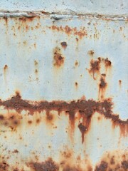 The color of the train carriages is rusted over time.  until the paint that prevents rust comes off