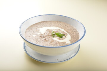 home made hot mushroom thick soup with French toast bread in white background western appetiser halal menu