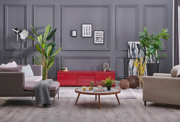 Obraz premium Grey living room television unit with sofa, home decoration modern background wall, green plant style.