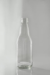 clear glass bottle on white background