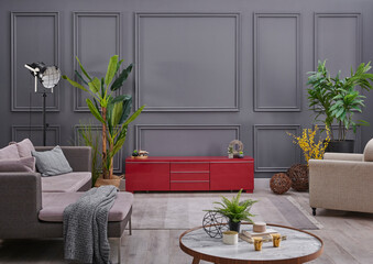 Grey living room television unit with sofa, home decoration modern background wall, green plant style.