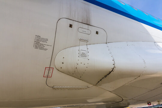 Amsterdam Schiphol Airport, North Holland/the Netherlands - March 10 2016: emurgency exit door of a KLM fokker 100 passenger aircraft on the viewing platform