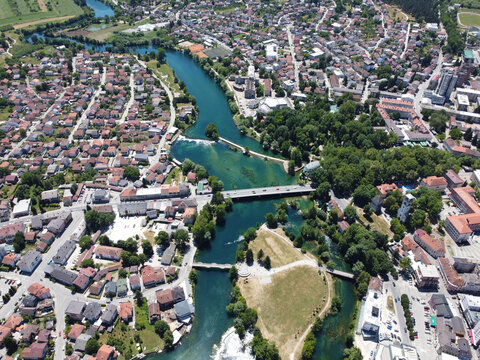 Aerial drone view Bihac and Una river in Bosnia and Herzegovina. Buildings, streets and residential houses. Bihać is a town and municipality in western BiH.