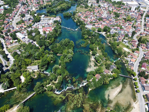 Aerial drone view Bihac and Una river in Bosnia and Herzegovina. Buildings, streets and residential houses. Bihać is a town and municipality in western BiH.
