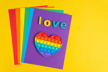 Words of love are made of letters from wood, for Valentines Day greeting romantic postcard. Top view