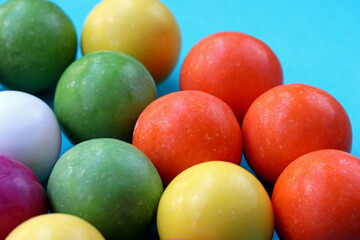 close-up colorful gum balls in the background
