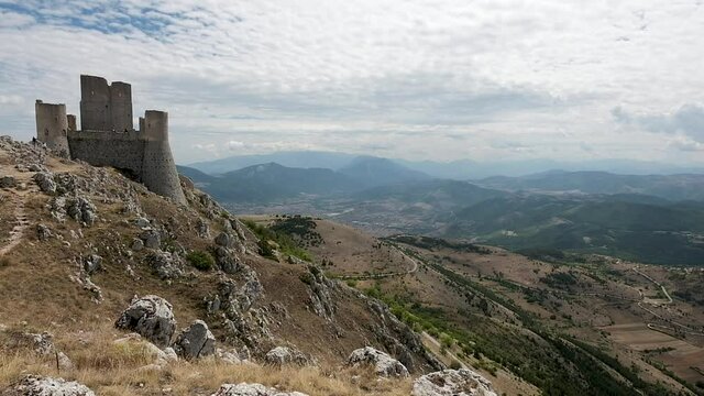 Rocca Calascio Castle, a medieval village located in the Gran Sasso National Park and the Laga mounts, Abruzzo. Located between the Navelli valley and the Tirino valley on a windy summer day
