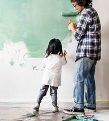 Asian family renovating the house