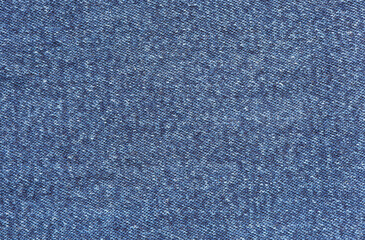 Closeup jeans fabric texture. Denim jeans background.