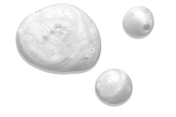 Pearly white thick creamy texture with bubbles. Soap or liquid cream with pearl colour on white...