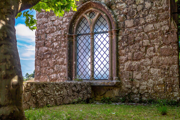 Old church window with beautiful backlight, Sintra Portugal - obrazy, fototapety, plakaty