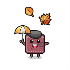 cartoon of the cute leather wallet holding an umbrella in autumn