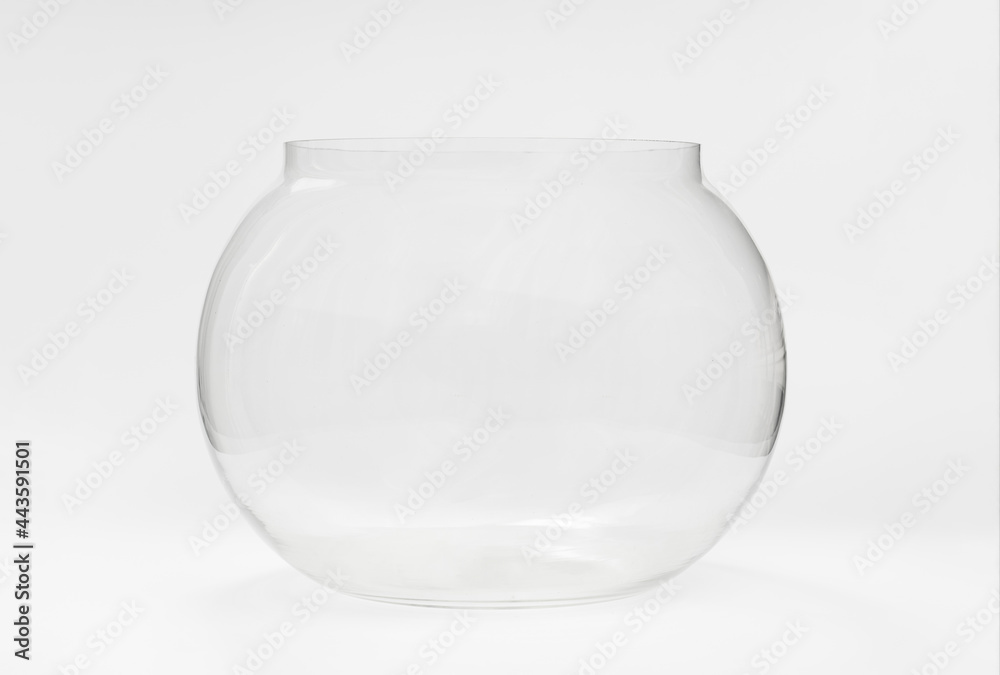 Wall mural empty round glass aquarium. Aquarium for fish and as an element of decor, vase.