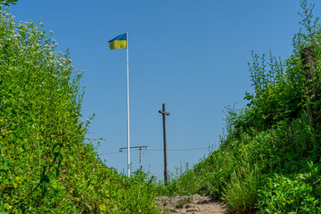 Ukrainian flag on Ruins of Khust castle in Khust, Ukraine on June 24, 2021.