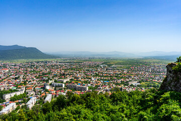 Fototapeta na wymiar Panoramic view of Kust city from Khust castle in Khust, Ukraine on June 24, 2021.