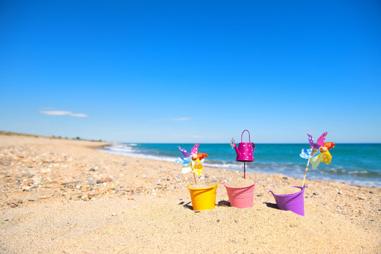Toy buckets at the beach