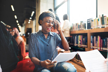 Happy student at the library