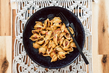 vegan carbonara pasta with dairy-free sauce and plant-based bacon, healthy plant-based food