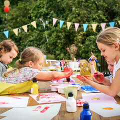 Group of young kids enjoying artworks