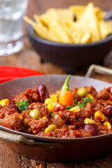 chili con carne on wood