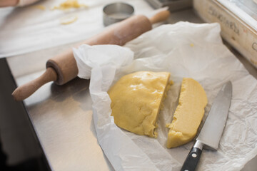 Fototapeta na wymiar slice of pastry dough and knife 