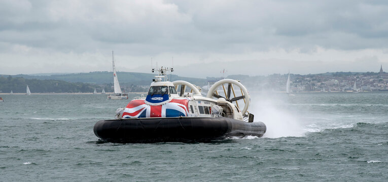 Southsea, Portsmouth, England, UK. July 2021. Passenger hovercraft approaching the mainland with the Isle of Wight in the background.