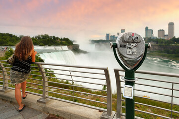 Overview of Niagara Falls with beautiful sunset, Niagara Falls  is a group of three waterfalls at the southern end of Niagara Gorge, in New York State USA