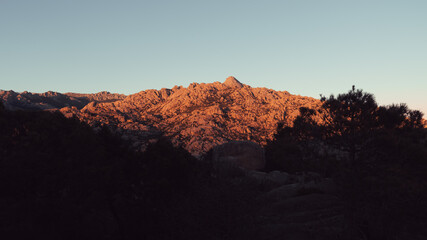 Fototapeta na wymiar sunset in the mountains of pedriza, madrid
