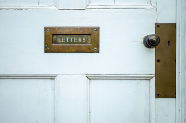 old door with postbox