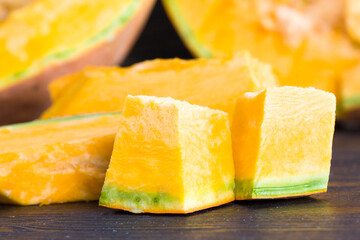 sliced and gutted orange pumpkin