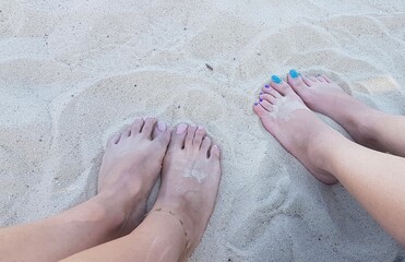 feet on the beach
