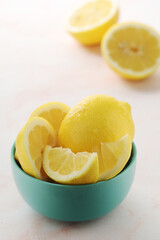 A bowl with yellow bright lemons