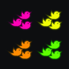 Fototapeta na wymiar Birds Group four color glowing neon vector icon