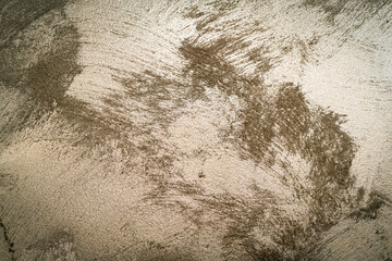 Grainy wall texture with metallic particles