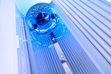 Close up of vertical solarium for tanning skin in spa salon