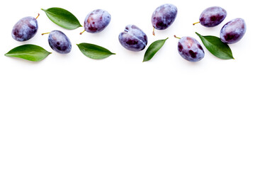 Food pattern - set of purple plums, top view