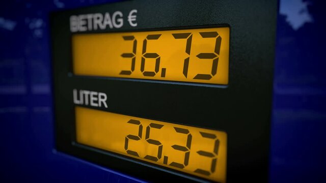 German fuel dispenser display. Real-time fueling process with slow zoom-in motion.