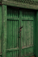 Old green wooden doors outdoors