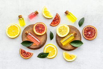 Organic cosmetics essential oil with citrus fruits. Top view