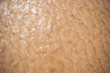 Sand background texture under water.