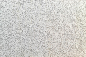 Smooth and even texture of the kitchen table surface with small patterns