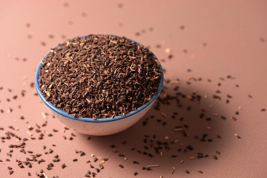 Syrian rue -Peganum harmala- seeds in a bowl. Peganum seeds are known to possess hypothermic, and essentially hallucinogenic properties.